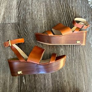 Michael Kors. Light brown. Wedge sandals. Good condition! Wedge height - 3 in.